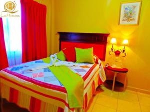 Postel nebo postele na pokoji v ubytování Hotel Las Hamacas