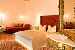 Katil atau katil-katil dalam bilik di Burg Colmberg Hotel
