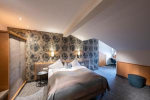 Posteľ alebo postele v izbe v ubytovaní Hotel Königgut