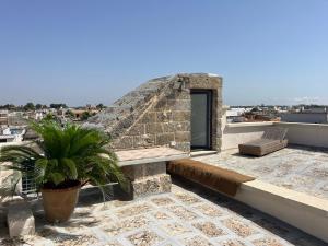 a view from the roof of a building with a pyramid at La Torretta dimora storica in Montesano Salentino