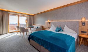 Posteľ alebo postele v izbe v ubytovaní Hotel Königgut