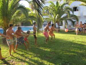 a group of people playing a game of volley ball at Alessandro in Sidari