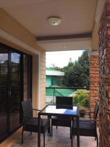 Stolní tenis v ubytování Tagaytay Rest House nebo okolí