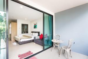 Un ou plusieurs lits dans un hébergement de l'établissement Apartments at The Bliss Condo by Lofty
