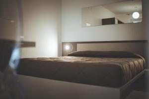 Postel nebo postele na pokoji v ubytování Casa La Strea - Vivi Salento