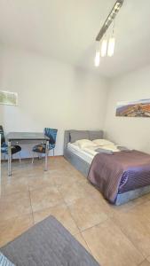 Voodi või voodid majutusasutuse Józefina Apartament's z dotępem do mini SPA toas