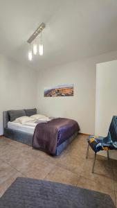 Voodi või voodid majutusasutuse Józefina Apartament's z dotępem do mini SPA toas