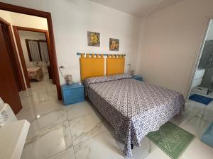 Postel nebo postele na pokoji v ubytování Villa ORCHIDEA