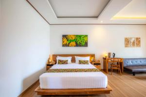 Voodi või voodid majutusasutuse Uma Nandhi Villa Ubud toas