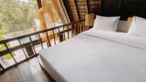 เตียงในห้องที่ 1 bedrooms villa canggu +33 ภาพ