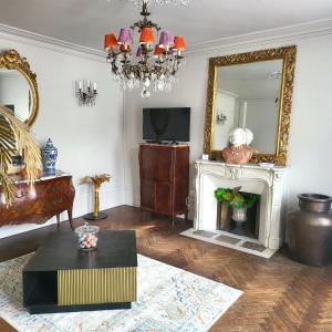 TV a/nebo společenská místnost v ubytování Le Figuier centre d Etretat et son parking privé à 5min