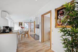 Nhà bếp/bếp nhỏ tại Jenapartments Penthouse Terrasse Waschtrockner sehr zentral