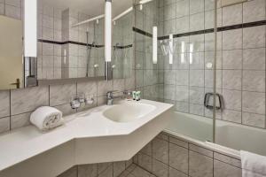 Kúpeľňa v ubytovaní Seehotel Winkelried