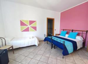 Postel nebo postele na pokoji v ubytování Allegroitalia Torre Artale Palermo