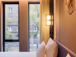 Movenpick Hotel Tallinn客房内的一张或多张床位