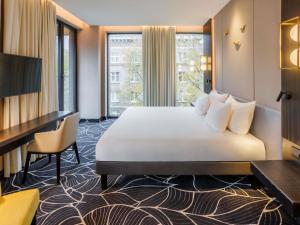 Movenpick Hotel Tallinn客房内的一张或多张床位