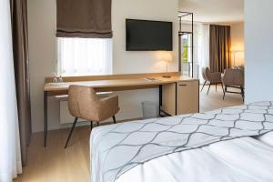Posteľ alebo postele v izbe v ubytovaní Seehotel Winkelried