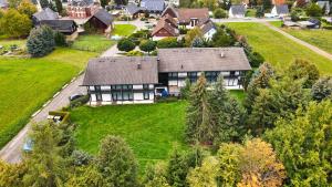 an aerial view of a house in a residential neighborhood at Hotel Abendroth in Chemnitz