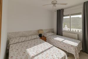 Ένα ή περισσότερα κρεβάτια σε δωμάτιο στο Casa Vista Calpe +17 φωτογραφίες