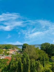 a view of a town with trees and water at Makao in Kilifi