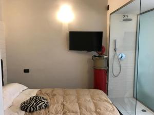 Postel nebo postele na pokoji v ubytování camere e condoApartment