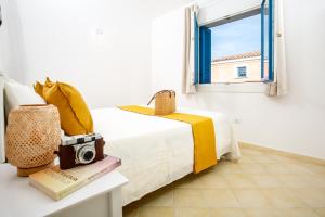 Katil atau katil-katil dalam bilik di TORO FLAT V 15' Palau, 30' Porto cervo & FREE PARKING
