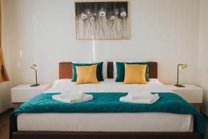 Rúm í herbergi á Hotel Brcko Gas Doboj