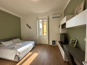 Ένα ή περισσότερα κρεβάτια σε δωμάτιο στο Arrietty's apartment