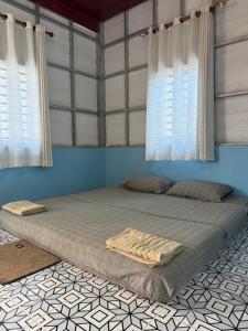 Katil atau katil-katil dalam bilik di Lazy Mango Home Stay