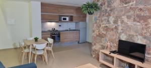 Kuchyň nebo kuchyňský kout v ubytování Claris B&B - Apartments + 16 fotografií