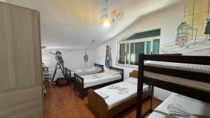 Katil atau katil-katil dalam bilik di Arka Hostel