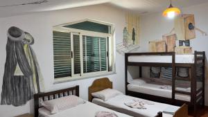 Katil atau katil-katil dalam bilik di Arka Hostel