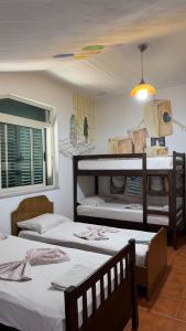 Katil atau katil-katil dalam bilik di Arka Hostel