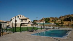 Πισίνα στο ή κοντά στο Apartamentos Doña Urraca
