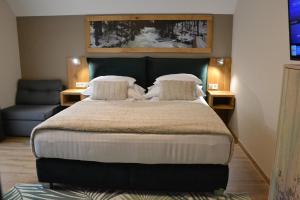 Rúm í herbergi á apartmány Špacír