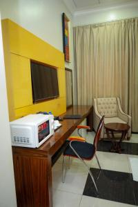 Televisor o centre d'entreteniment de Doha Dynasty Hotel