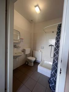 Koupelna v ubytování Sport Kompleks