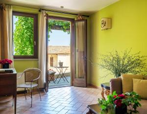Posezení v ubytování Borgo degli Ulivi - Castello di Montegridolfo