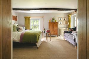 Postel nebo postele na pokoji v ubytování The Room at Rawsons