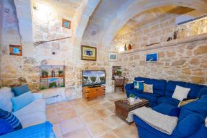 Χώρος καθιστικού στο Razzett Matli Holiday Home