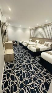 Al ‘Azīzīyahにあるفندق مسار الأمل الذهبي - أثمان سابقاًのギャラリーの写真