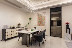 a kitchen and dining room with a table and chairs at 故渝里两室两卫 in Chongqing +20 photos