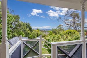 a view from the porch of a house at Whisper on the Falls in Wentworth Falls