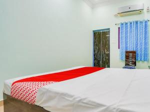 Ένα ή περισσότερα κρεβάτια σε δωμάτιο στο Hotel O Kanha +21 φωτογραφίες