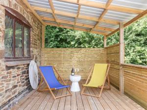 Sân trong/khu vực ngoài trời tại Tigley Meadow Coach House