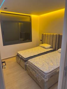 En eller flere senge i et værelse på Luxe Appartement Haut Standing Nador Lagoon Rif + 24 billeder