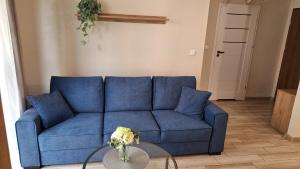 Posedenie v ubytovaní Apartament Dębowy z miejscem parkingowym