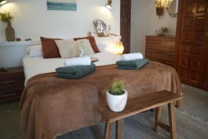 Voodi või voodid majutusasutuse Porta d'Irta toas