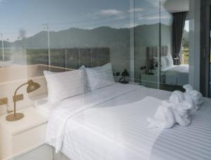 Ένα ή περισσότερα κρεβάτια σε δωμάτιο στο Private Pool Villa Melina - Koh Chang +41 φωτογραφίες