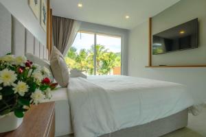 Sjónvarps- og/eða afþreyingartæki á Lazure Pool Villa - Koh Chang